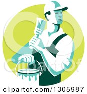 Clipart Of A Retro Male House Painter Holding A Brush And Bucket Looking Back In A Green Circle Royalty Free Vector Illustration