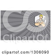Clipart Of A Retro Caucasian Male Construction Or Builder Worker With Folded Arms And A Wrench And Gray Rays Background Or Business Card Design Royalty Free Illustration