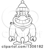 Poster, Art Print Of Cartoon Black And White Happy Yeti Abominable Snowman Monkey Wearing A Winter Hat And Scarf