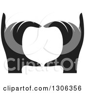 Clipart Of A Pair Of Black Silhouetted Hands Forming A Heart Royalty Free Vector Illustration