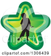 Clipart Of A Black Silhouetted Boy In A Green Star Royalty Free Vector Illustration by Lal Perera