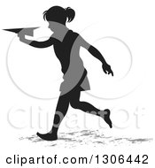 Poster, Art Print Of Black Silhouetted Girl Running And Playing With A Paper Plane