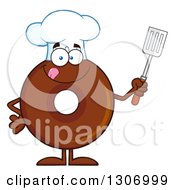 Cartoon Happy Round Chocolate Donut Chef Character Holding A Spatula