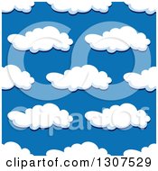 Poster, Art Print Of Seamless Pattern Background Of Puffy Clouds In A Blue Sky 6