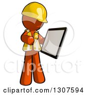 Contractor Orange Man Worker Holding And Looking At A Tablet Computer