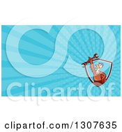 Clipart Of A Cartoon Turkey Bird Worker Mechanic Man In A Shield Holding Up A Wrench And Blue Rays Background Or Business Card Design Royalty Free Illustration