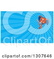 Clipart Of A Retro Woodcut Orange Elephant Head And Blue Rays Background Or Business Card Design Royalty Free Illustration