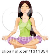Beautiful Young Asian Woman Meditating In The Lotus Pose