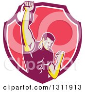 Clipart Of A Retro Male Bodybuilder Lifting A Kettlebell And Emerging From A Pink And White Shield Royalty Free Vector Illustration
