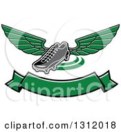 Clipart Of A Black And White Soccer Cleat Shoe With Green Wings Over A Blank Banner Royalty Free Vector Illustration