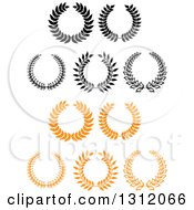 Clipart Of A Black And White And Orange Laurel Wreaths 5 Royalty Free Vector Illustration