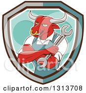 Cartoon Bull Man Mechanic Mascot With Folded Arms Holding A Wrench In A Shield