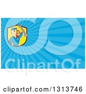 Clipart Of A Cartoon Turkey Bird Worker Mechanic Man Holding Up A Wrench And Bright Blue Rays Background Or Business Card Design Royalty Free Illustration