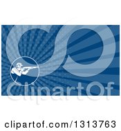 Clipart Of A Retro Trap Shooter Aiming A Shot Gun And Blue Rays Background Or Business Card Design Royalty Free Illustration