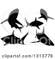 Clipart Of Silhouetted Black Tip Sharks Swimming Royalty Free Vector Illustration by dero