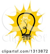 Clipart Of A Shining Yellow Light Bulb Royalty Free Vector Illustration