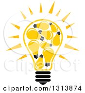 Clipart Of A Shining Yellow Light Bulb With Other Bulbs Inside Of It Royalty Free Vector Illustration