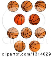 Clipart Of Cartoon Orange And Black Basketballs Royalty Free Vector Illustration