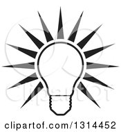 Clipart Of A Shining Black And White Bright Light Bulb And Rays Royalty Free Vector Illustration