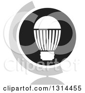 White Led Light Bulb In A Round Black Icon With A Reflection And Globe Stand