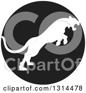 White Silhouetted Leaping Cougar Or Tiger In A Black Circle
