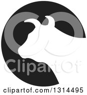 Clipart Of A White Silhouetted Bull Head Over A Black Round Icon Royalty Free Vector Illustration by Lal Perera