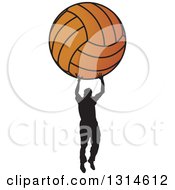Clipart Of A Black Silhouetted Man Holding Up A Giant Basketball Royalty Free Vector Illustration
