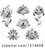Clipart Of Black And White Henna And Lotus Flowers 9 Royalty Free Vector Illustration