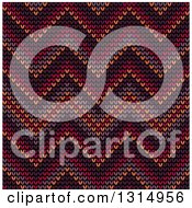 Seamless Background Pattern Of Knitted Brown Orange Burgundy Purple And Red Chevrons
