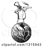 Poster, Art Print Of Black And White Woodcut Male Chef Holding A Hot Pizza Box And Standing On Planet Earth