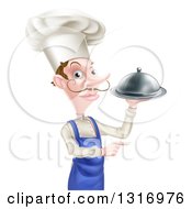 Clipart Of A White Male Chef With A Curling Mustache Pointing And Holding A Cloche Platter Royalty Free Vector Illustration