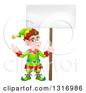 Poster, Art Print Of Cartoon Happy Male Christmas Elf Holding A Blank Sign