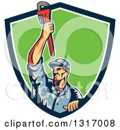 Poster, Art Print Of Retro White Male Plumber Holding Up A Monkey Wrench And Emerging From A Blue White And Green Shield