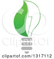 Clipart Of A Half Leaf Half Glass Light Bulb Royalty Free Vector Illustration