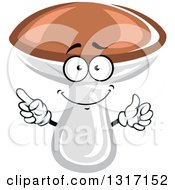 Clipart Of A Cartoon Forest Mushroom Character Giving A Thumb Up And Pointing Royalty Free Vector Illustration