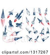Clipart Of Retro Blue And Red Rockets Royalty Free Vector Illustration