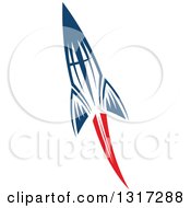 Clipart Of A Retro Blue Rocket With Red Flames 7 Royalty Free Vector Illustration