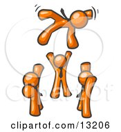 Group Of Orange Men Tossing Another Into The Air Clipart Illustration