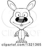 Lineart Clipart Of A Cartoon Black And White Happy Rabbit In Pjs Royalty Free Outline Vector Illustration