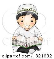 Poster, Art Print Of Happy Muslim Boy Sitting On The Floor And Reading The Quran