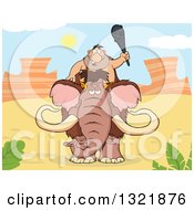 Cartoon Caveman Holding Up A Club And Riding A Woolly Mammoth In The Desert