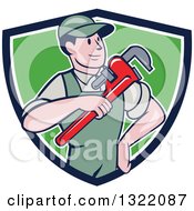 Poster, Art Print Of Retro Cartoon White Male Plumber Holding A Giant Monkey Wrench In A Blue White And Green Shield