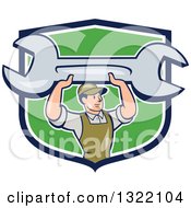 Poster, Art Print Of Cartoon White Male Mechanic Holding Up A Giant Spanner Wrench And Emerging From A Blue White And Green Shield