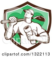 Poster, Art Print Of Retro Drainlayer Man Carrying A Shovel And Pipe In A Brown White And Green Shield