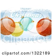 Poster, Art Print Of Merry Christmas Greeting With Transparent Baubles On Blue With Snow