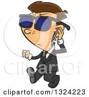 Clipart Of A Cartoon White Security Boy Walking And Adjusting An Ear Piece Royalty Free Vector Illustration