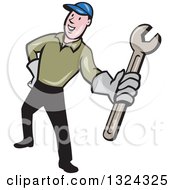 Clipart Of A Cartoon White Male Mechanic Holding Out A Wrench Royalty Free Vector Illustration