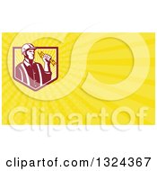 Clipart Of A Retro Male Electrician Holding A Bolt And Yellow Rays Background Or Business Card Design Royalty Free Illustration