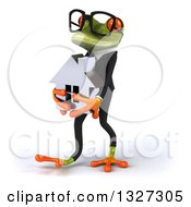 Clipart Of A 3d Green Bespectacled Business Springer Frog Walking To The Left And Holding A House Royalty Free Illustration