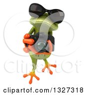 Clipart Of A 3d Green Springer Frog Wearing Sunglasses Leaping And Taking Pictures With A Camera Royalty Free Illustration